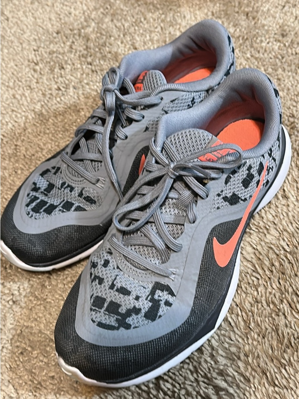 Nike Women’s Black and White Athletic Shoes with Orange Swoosh